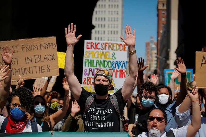 Current and former New York City Mayor's staff gather to call for reforms during a protest against racial inequality in the aftermath of the death in Minneapolis police custody of George Floyd, in New York