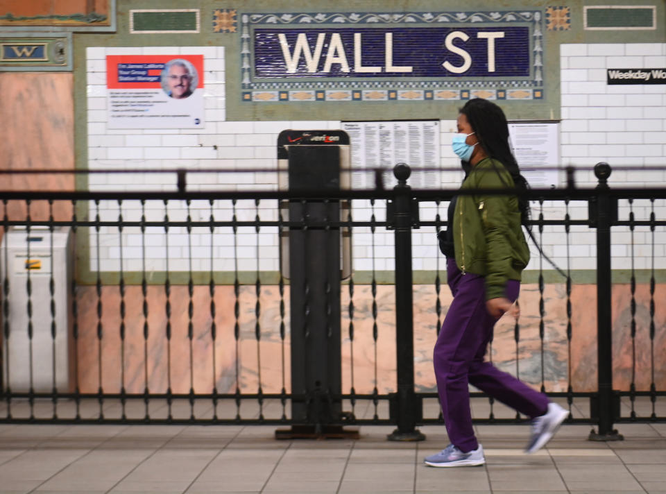 A person walks at the Wall Street subway stop on April 23, 2020 in New York City. - More than one in five New Yorkers may have already had the new coronavirus, a testing sample showed April 23, 2020, suggesting infections are much higher than confirmed cases suggest. Widespread testing -- including for antibodies -- is viewed as key to American states being able to lift stay-at-home orders and reopen their shuttered economies. (Photo by Angela Weiss / AFP) (Photo by ANGELA WEISS/AFP via Getty Images)