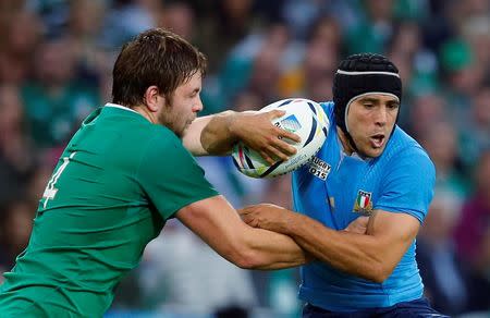 Italy's Edoardo Gori and Ireland's Iain Henderson in action. Ireland v Italy - IRB Rugby World Cup 2015 Pool D - Olympic Stadium, London, England - 4/10/15. Reuters / Eddie Keogh Livepic