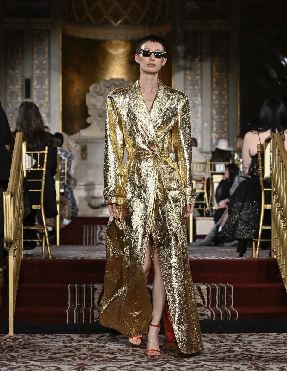 A model walks the runway during the Christian Siriano Fall/Winter 2024 fashion show at The Plaza Hotel during New York Fashion Week on Thursday, Feb. 8, 2024, in New York. (Photo by Evan Agostini/Invision/AP)