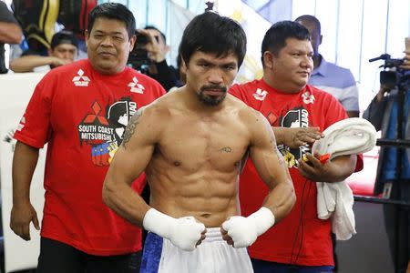 Boxer Manny Pacquiao poses after working out ahead of his bout with Tim Bradley, in Hollywood, Los Angeles, California, United States, March 30, 2016. REUTERS/Lucy Nicholson
