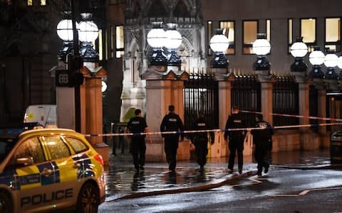 Police officers walk towards Charing Cross station after it was shut due to a gas leak - Credit: DYLAN MARTINEZ /Reuters