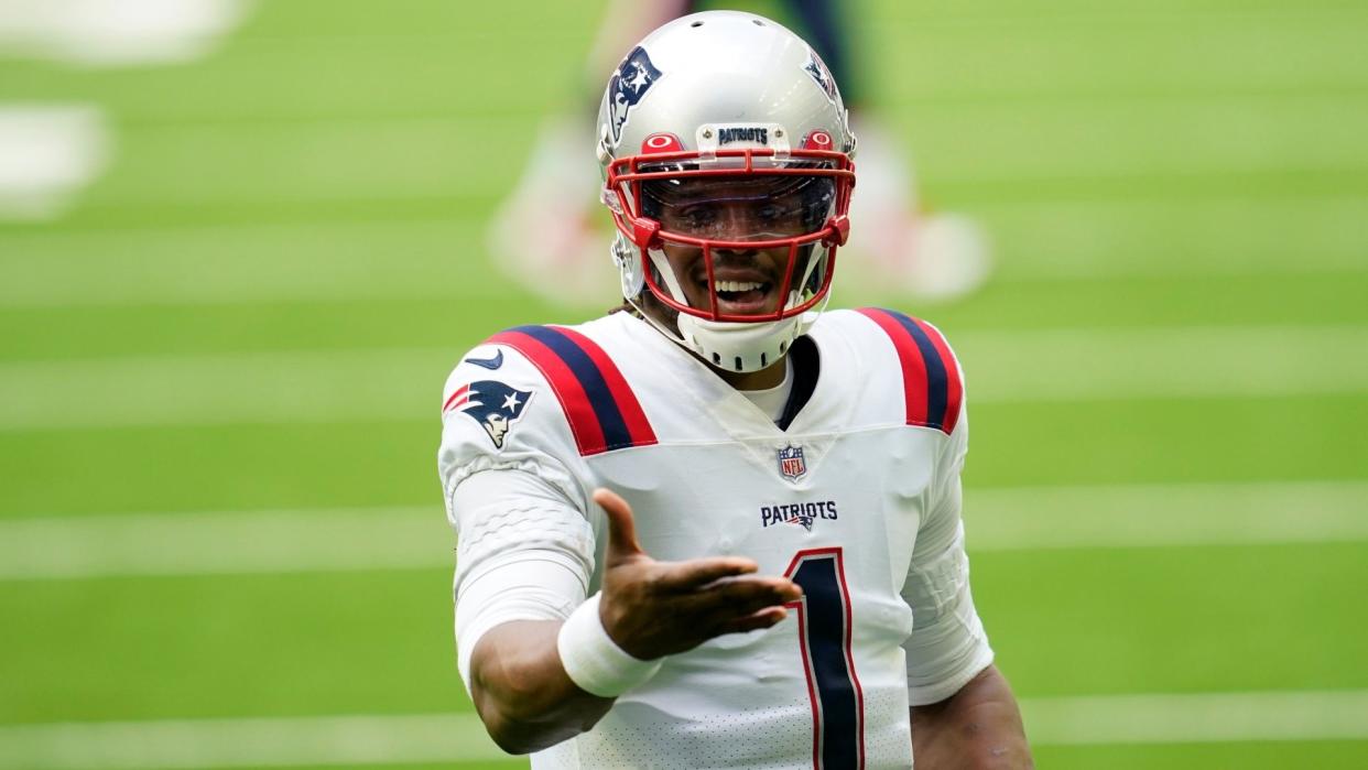 Mandatory Credit: Photo by Matt Patterson/AP/Shutterstock (11028862pu)New England Patriots quarterback Cam Newton (1) looks to celebrate after a touchdown pass during an NFL football game against the Houston Texans, in HoustonPatriots Texans Football, Houston, United States - 22 Nov 2020.