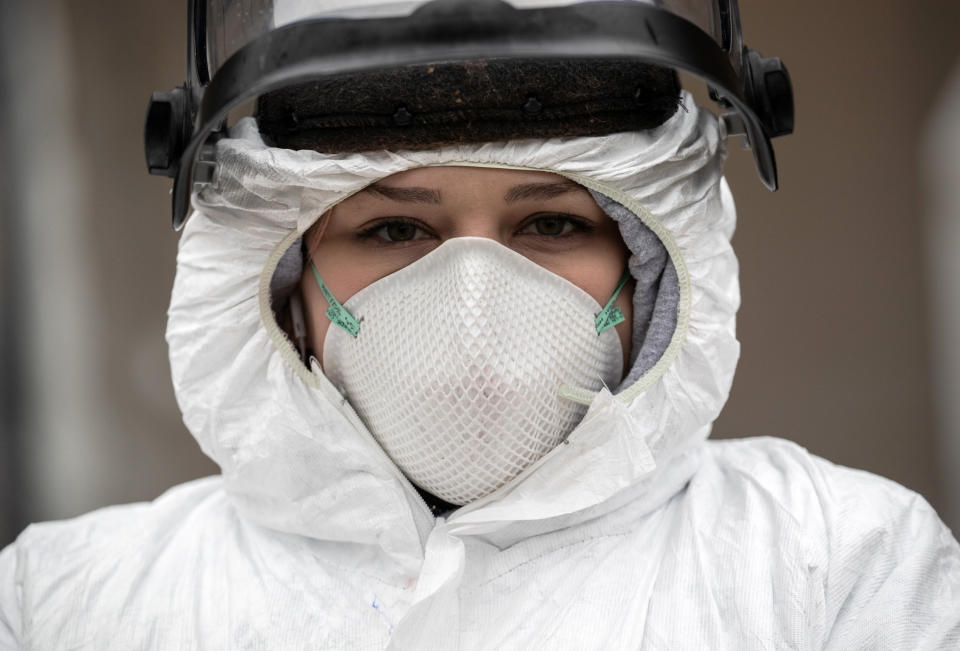 Nurse Hannah Sutherland, dressed in personal protective equipment, awaits new patients at a drive-thru coronavirus testing station at Cummings Park on March 23, 2020, in Stamford, Connecticut. (Photo: John Moore/Getty Images)