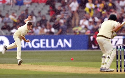 England bowler Chris Woakes (L) sends down a delivery to Australia's batsman Cameron Bancroft - Credit: WILLIAM WEST/AFP/Getty Images