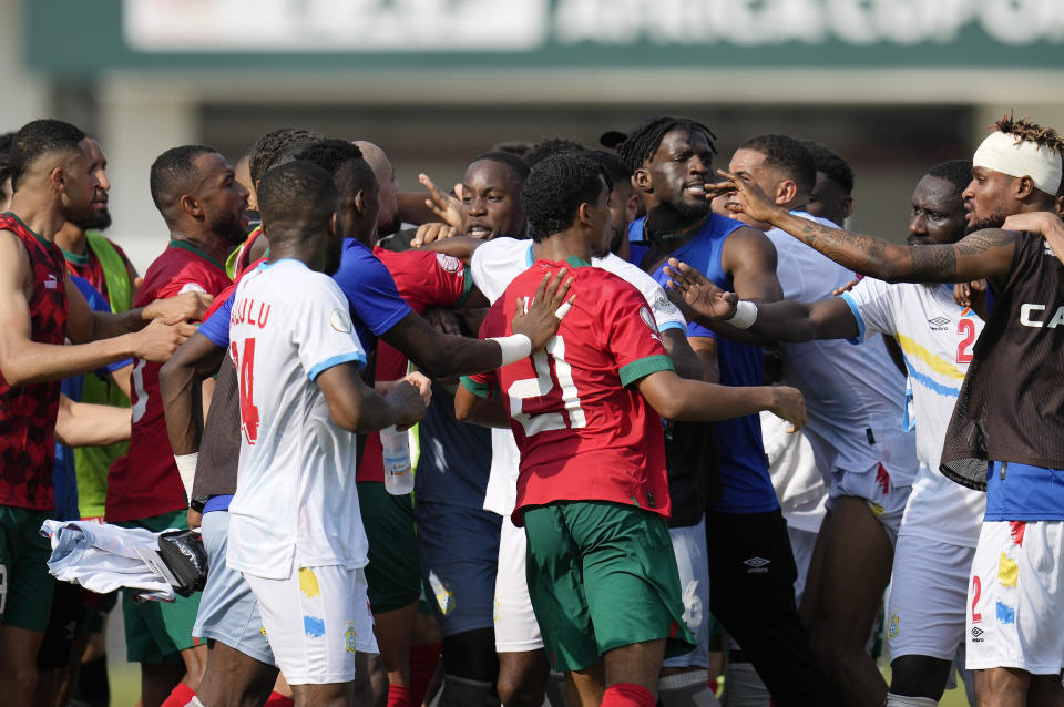 Players of Morocco and Congo argue after the final whistle of the African Cup of Nations Group F soccer match between Morocco and DR Congo, at the Laurent Pokou stadium in San Pedro, Ivory Coast, Sunday, Jan. 21, 2024. (AP Photo/Themba Hadebe)