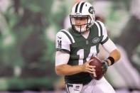 Aug 10, 2018; East Rutherford, NJ, USA; New York Jets quarterback Sam Darnold (14) rolls out during the second half against the Atlanta Falcons at MetLife Stadium. Mandatory Credit: Vincent Carchietta-USA TODAY Sports