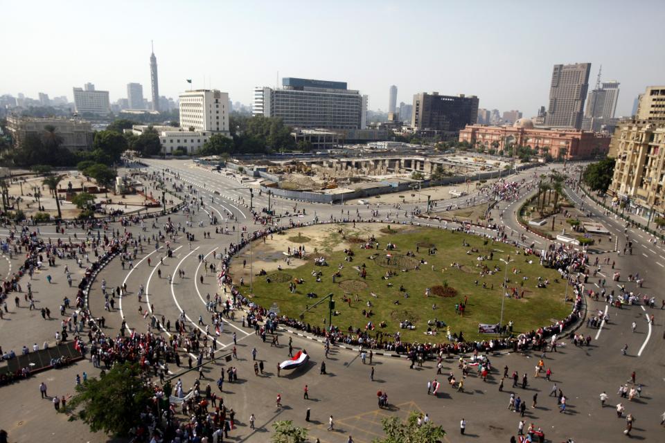 People gather in Tahrir square to celebrate the anniversary of an attack on Israeli forces during the 1973 war, in Cairo October 6, 2013. REUTERS/Mohamed Abd El Ghany (EGYPT - Tags: POLITICS CIVIL UNREST)