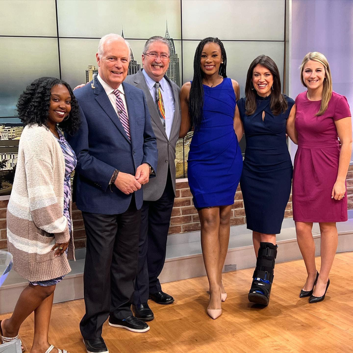 Throwback: In a photo taken when she was a news producer, Akievia McFarland smiles with the ‘News 5 This Morning’ team.