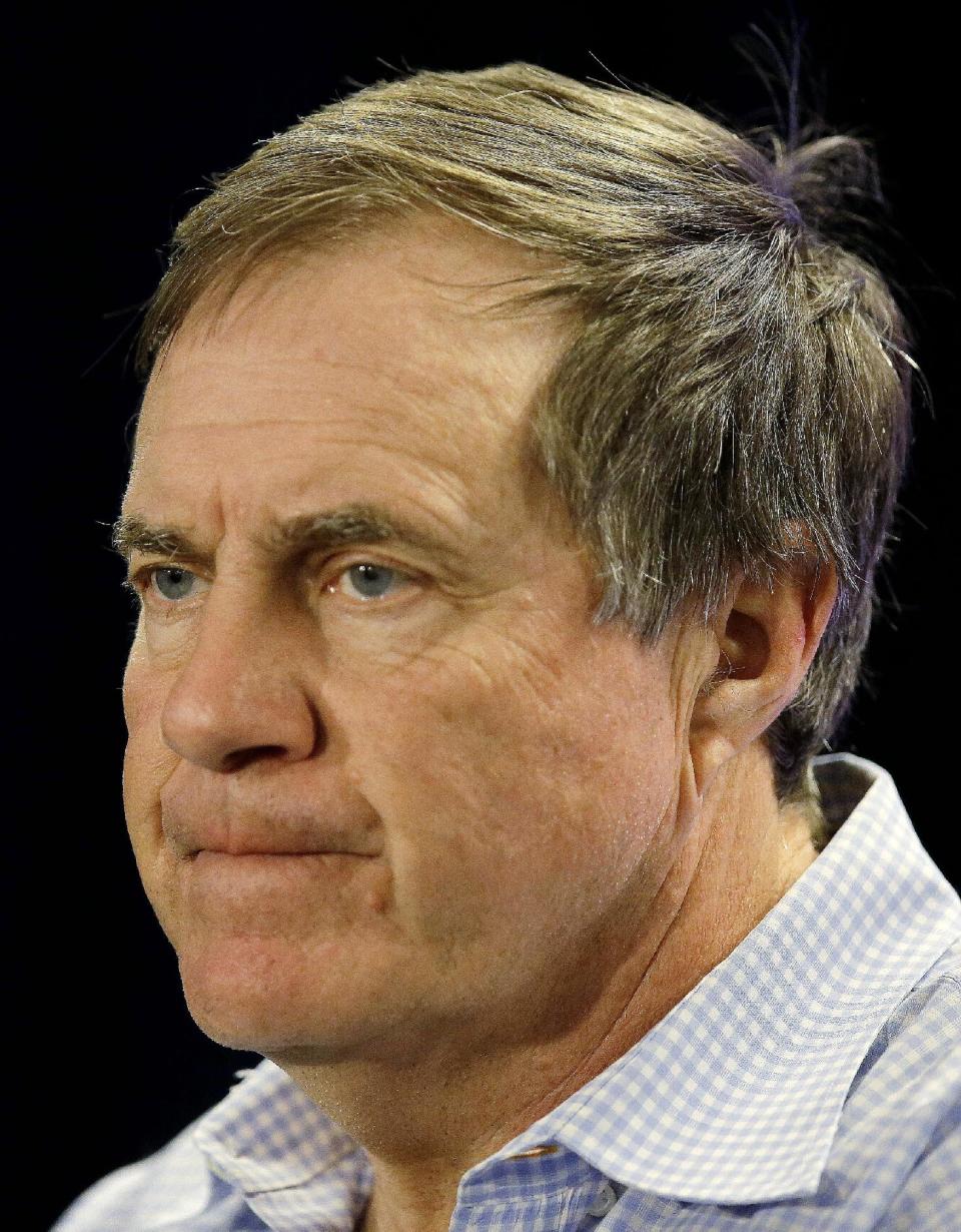 New England Patriots head coach Bill Belichick listens to a reporter's question during a media availability at the NFL football team's facility in Foxborough, Mass., Monday, Jan. 20, 2014. The Patriots lost to the Denver Broncos in the AFC Championship game Sunday in Denver ending their season. (AP Photo/Stephan Savoia)