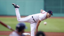 Boston Red Sox starting pitcher Nick Pivetta watches a delivery to a Houston Astros batter during the first inning of a baseball game at Fenway Park, Wednesday, May 18, 2022, in Boston. (AP Photo/Charles Krupa)