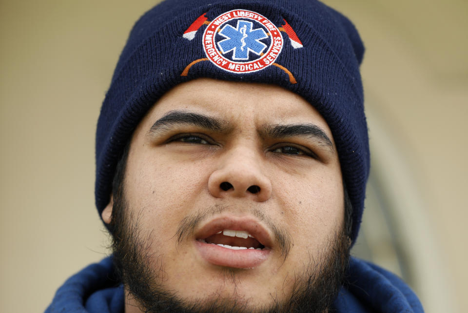 Omar Martinez talks about how the coronavirus has affected his family, Saturday, April 25, 2020, in West Liberty, Iowa. (AP Photo/Charlie Neibergall)