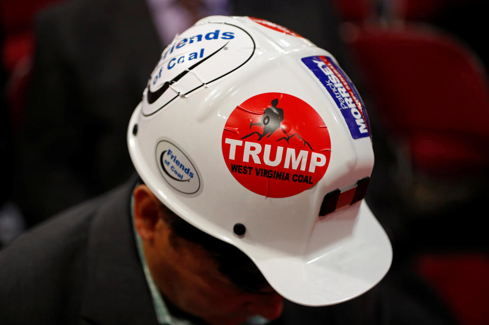 A West Virginia delegate wears a Trump sticker on his hard hat during the second day of the Republican National Convention in Cleveland, Ohio, U.S. July 19, 2016. REUTERS/Aaron P. Bernstein/File Photo