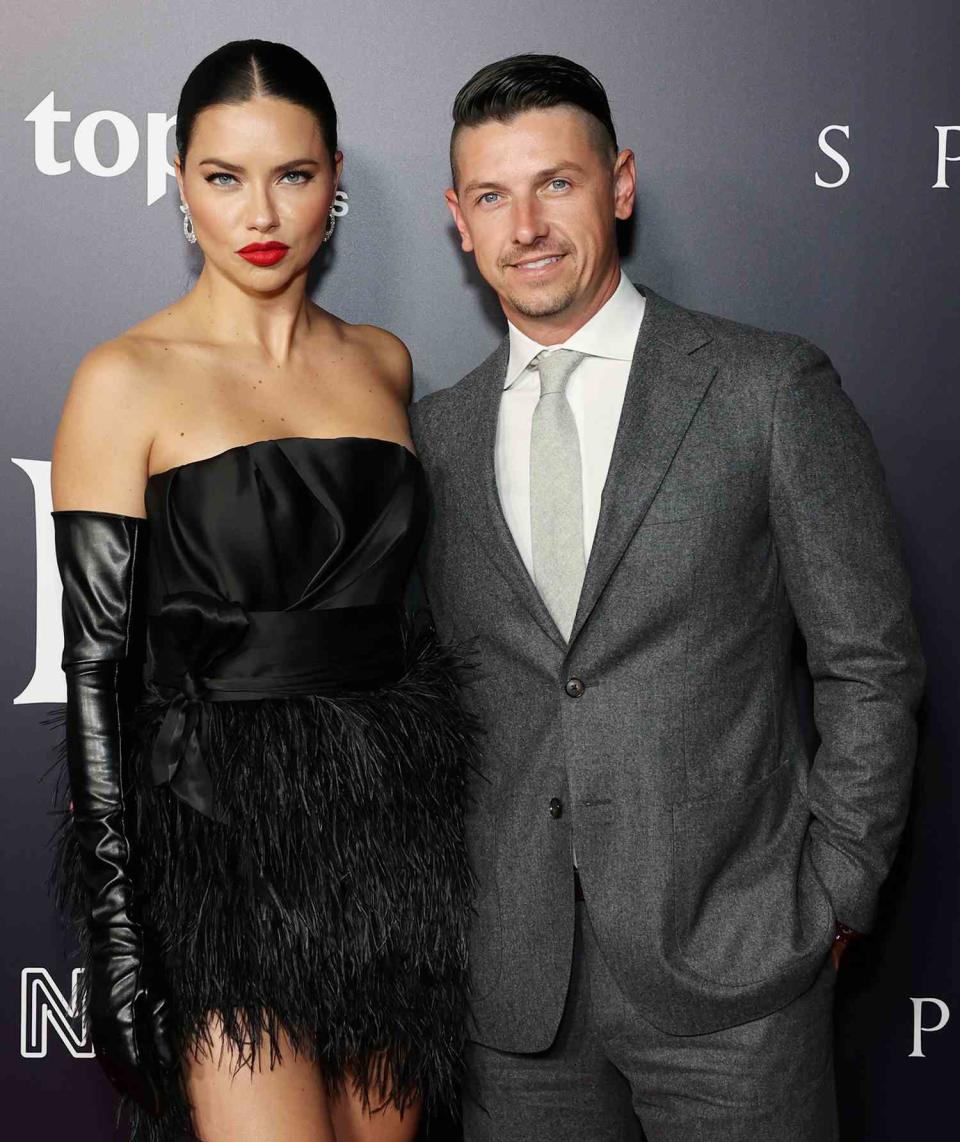 Adriana Lima (L) and Andre Lemmers (R) attend the Los Angeles premiere of Neon's "Spencer" at DGA Theater Complex on October 26, 2021 in Los Angeles, California