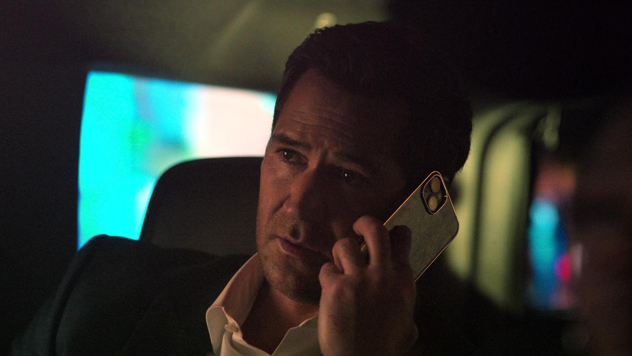   Manuel Garcia-Rulfo as Mickey Haller on the phone in the car in The Lincoln Lawyer season 2 episode 9 