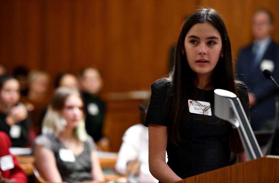 Elizabeth Barnes presents her opening statement as Sullivan Middle School gets underway for a mock trial at the federal courthouse Monday evening.