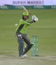 Lahore Qalandars' Ben Dunk plays a shot during a Pakistan Super League T20 cricket match between Karachi Kings and Lahore Qalandars at the National Stadium, in Karachi, Pakistan, Sunday, Feb. 28, 2021. (AP Photo/Fareed Khan)