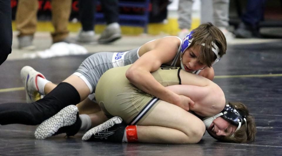 Horseheads' Coleton Owen, top, was an 11-4 winner over Corning's Riley Walker in the 132-pound third place match as Elmira's First Arena hosted the Southern Tier Classic wrestling tournament Jan. 14, 2022.