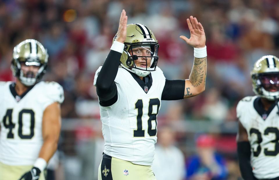 GLENDALE, ARIZONA - AUGUST 10: Spencer Rattler #18 of the New Orleans Saints signals his touchdown after review during the third quarter of a preseason football game against the Arizona Cardinals at State Farm Stadium on August 10, 2024 in Glendale, Arizona. (Photo by Mike Christy/Getty Images)