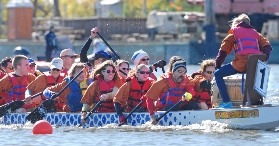 The Southwest Strokers team competes in a heat on Sept 22, 2012, during the Oshkosh Community Dragon Boat Race and Festival at Riverside Park.