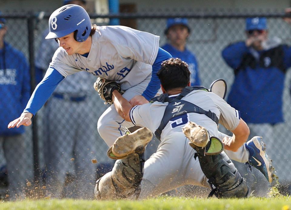 Wamps #19 Jack Titley collides with Flyers catcher Lucas Messer who could not kee hold of the ball, Titley was able to tag the plate and score for Braintree.

The Braintree High Wamps hosted the Framingham Flyers in baseball on Wednesday May 1, 2024