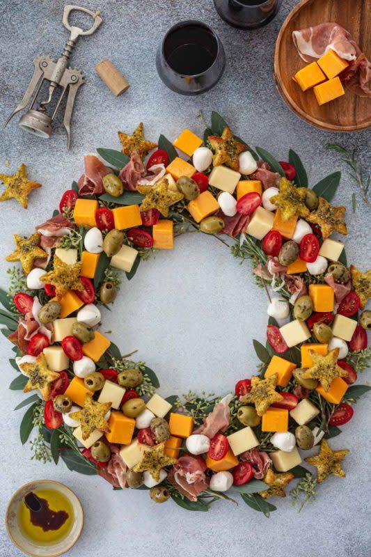 <p>Courtesy of Olivia's Cuisine</p><p>Olivia's Cuisine presents a streamlined Christmas-themed board, with cubed cheeses to achieve the wreath look.</p><p><strong>Get the Recipe: <a href="https://www.oliviascuisine.com/christmas-wreath-cheeseboard/" rel="nofollow noopener" target="_blank" data-ylk="slk:Christmas Cheeseboard Wreath;elm:context_link;itc:0;sec:content-canvas" class="link ">Christmas Cheeseboard Wreath</a></strong></p>