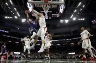 Milwaukee Bucks' Giannis Antetokounmpo shoots against Los Angeles Clippers' Ivica Zubac during the first half of an NBA basketball game Thursday, Feb. 2, 2023, in Milwaukee. The Bucks won 106-105. (AP Photo/Morry Gash)