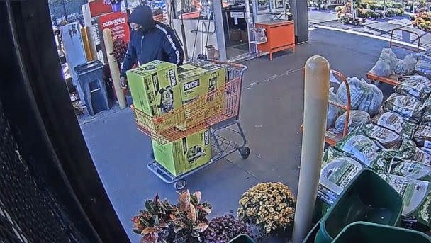 PHOTO: Surveillance video from inside a Home Depot store in Hillsborough, North Carolina, shows a man exiting the store after pushing down Gary Rasor in October 2022. (The Home Depot)