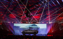 The Tesla Cybertruck is unveiled at Tesla's design studio Thursday, Nov. 21, 2019, in Hawthorne, Calif. CEO Elon Musk is taking on the workhorse heavy pickup truck market with his latest electric vehicle. (AP Photo/Ringo H.W. Chiu)