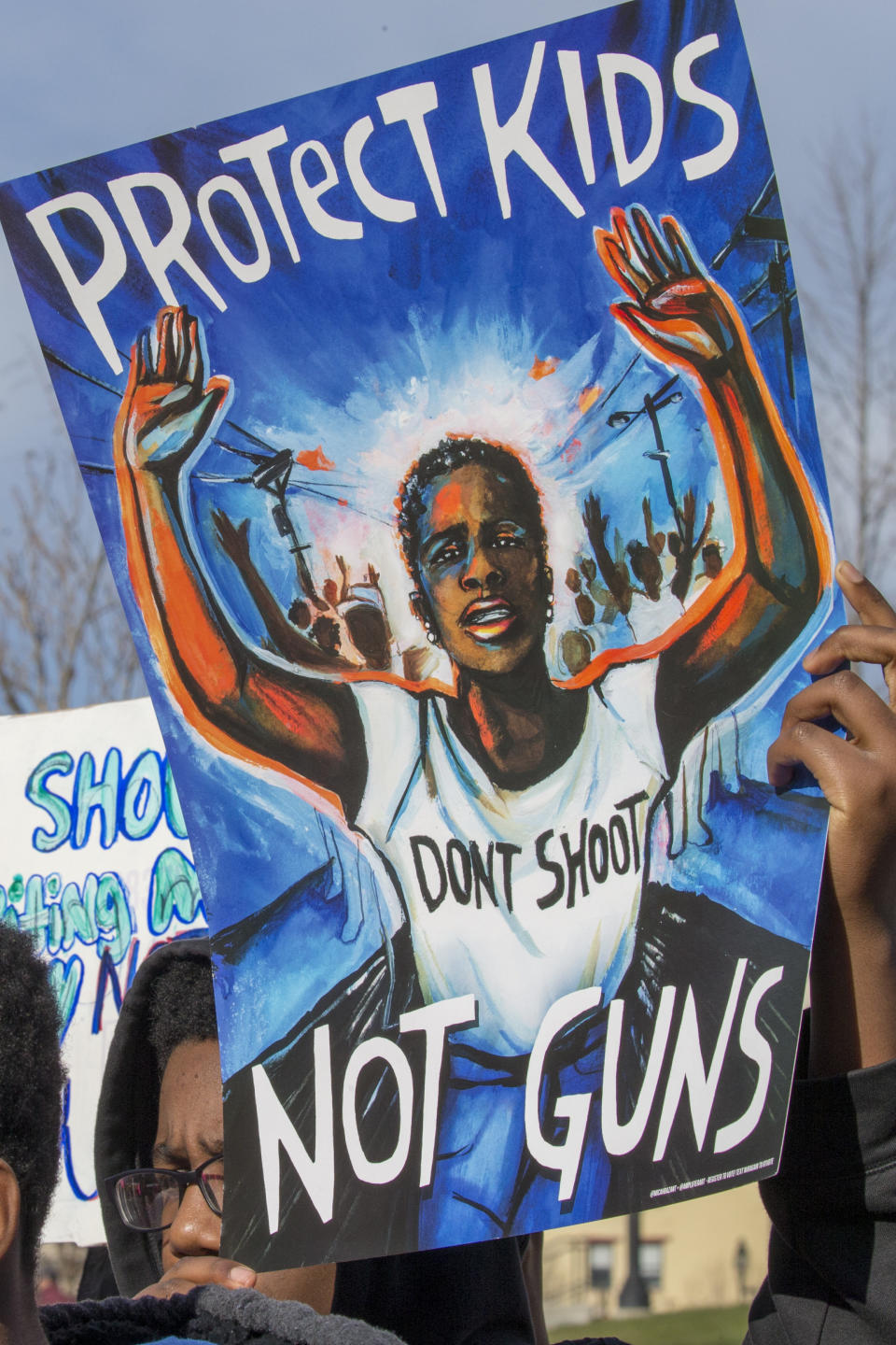 A student from Baltimore, Maryland, holds a protest sign during the rally in&nbsp;Washington.&nbsp;
