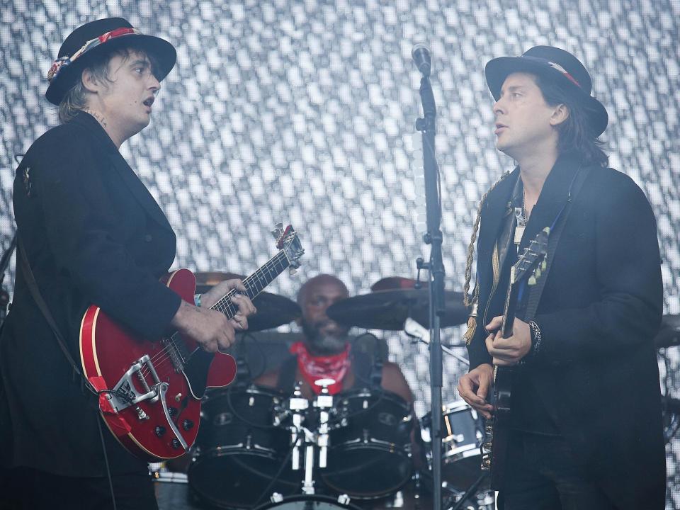 ‘Best seat in the house’: Powell with Doherty (left) and Barat on the Pyramid Stage at Glastonbury Festival, 2015 (Shutterstock)