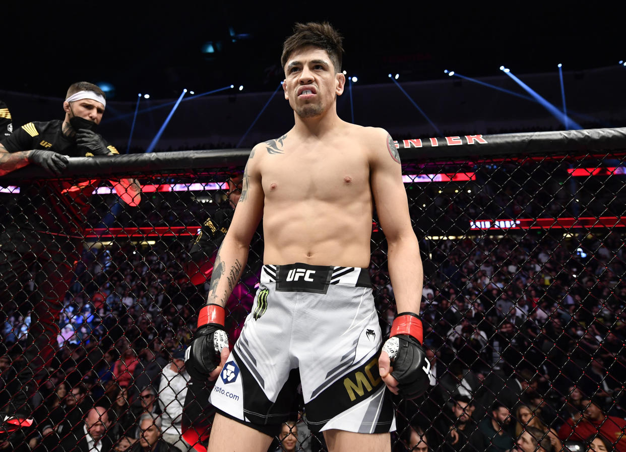 ANAHEIM, CALIFORNIA - JANUARY 22: Brandon Moreno of Mexico prepares to fight Deiveson Figueiredo of Brazil in their UFC flyweight championship fight during the UFC 270 event at Honda Center on January 22, 2022 in Anaheim, California. (Photo by Chris Unger/Zuffa LLC)