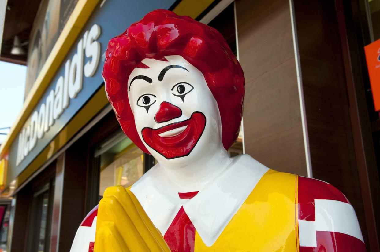 Chiang Mai, Thailand - November 27, 2011: Ronald McDonald doing a Thai wai greeting outside a McDonalds restaurant in this northern Thai city.