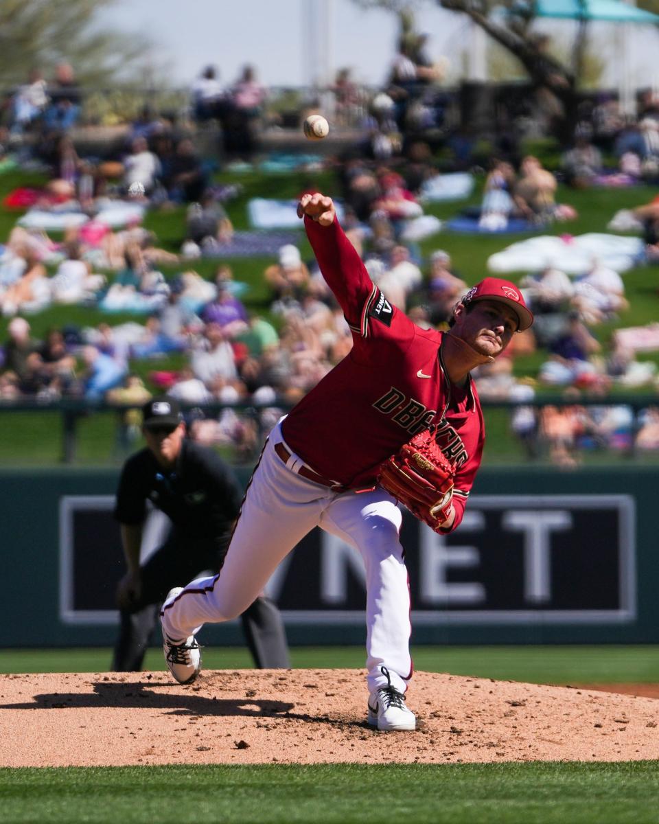 Diamondbacks pitcher Ryne Nelson (19) pitches during a Spring Training game against the Colorado Rockies at Salt River Fields on Saturday, Feb. 25, 2023, in Scottsdale.