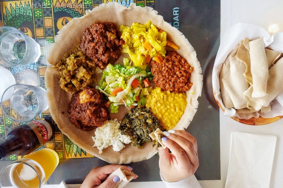 <b>Photo: Danielle G./<a href="https://yelp.com/biz_photos/addis-ethiopian-restaurant-oakland?select=B-FlA4ZZXSkKNs8Rve_Rcg&utm_campaign=a8a5af15-8343-4a71-8537-1b65c3b630aa%2C97313cde-8c09-432f-bfb2-f33d02f2bedb&utm_medium=81024472-a80c-4266-a0e5-a3bf8775daa7" rel="nofollow noopener" target="_blank" data-ylk="slk:Yelp;elm:context_link;itc:0;sec:content-canvas" class="link ">Yelp</a></b>