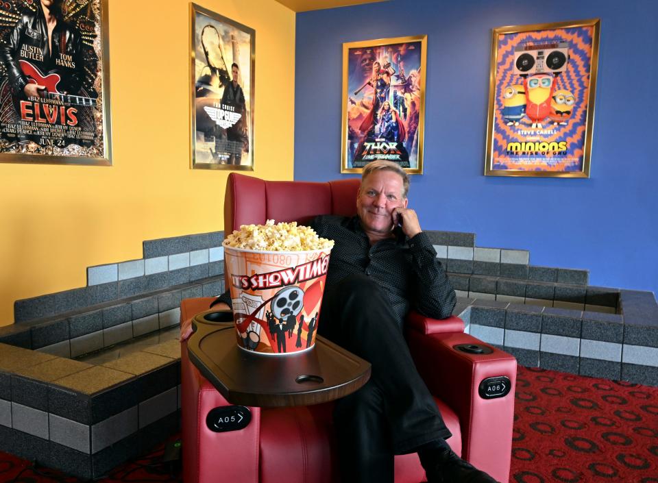 Bill Hanney is converting the 10 screens at Entertainment Cinemas in Dennis to have the Cape's first recliner seats, plus plans to add a bar and cafe to the complex. He's pictured sitting in one of the new reclining chairs that will be installed at Falmouth Cinema Pub.