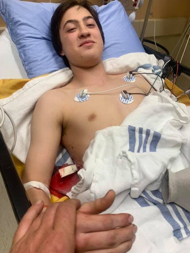 Stu Grabos said his son Colby was stabbed between the ribs early Sunday morning during an altercation at a bush party east of Kelowna, B.C. 