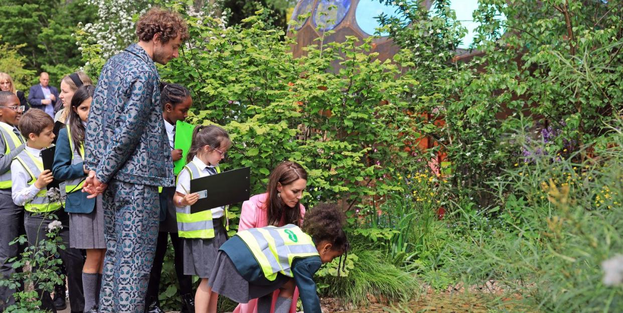 the princess of wales kate middleton joins school children on a visit to the rhs chelsea flower show 2023, pictured on the royal entomological society garden designed by tom massey
