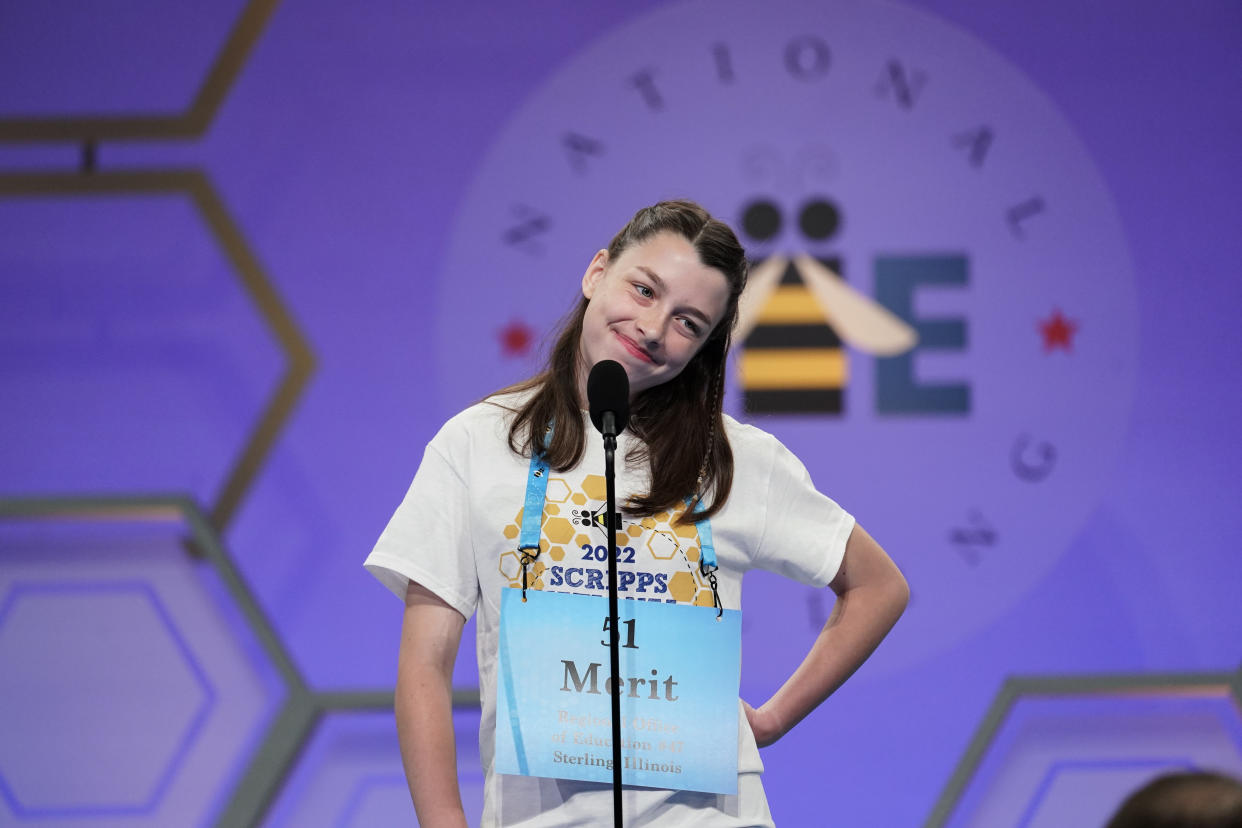 Merit Namaste-Rose, 14, from Oregon, Ill.,stands at the microphone during the Scripps National Spelling Bee, Tuesday, May 31, 2022, in Oxon Hill, Md. (AP Photo/Alex Brandon)