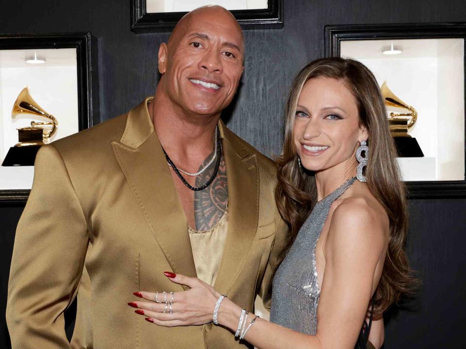 <p>Francis Specker/CBS/Getty</p> Dwayne Johnson and Lauren Hashian at THE 65Th Annual GRAMMY Awards in February 2023.