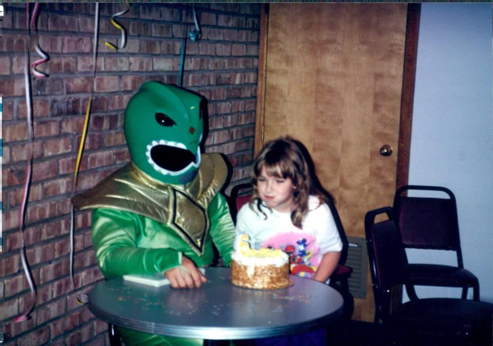 Six-year-old me being v. on theme with the Power Rangers shirt.