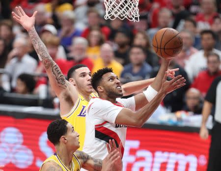 Oct 18, 2018; Portland, OR, USA; Portland Trail Blazers guard Evan Turner (1) shoots over Los Angeles Lakers guard Lonzo Ball (2) in the second half at Moda Center. Mandatory Credit: Jaime Valdez-USA TODAY Sports