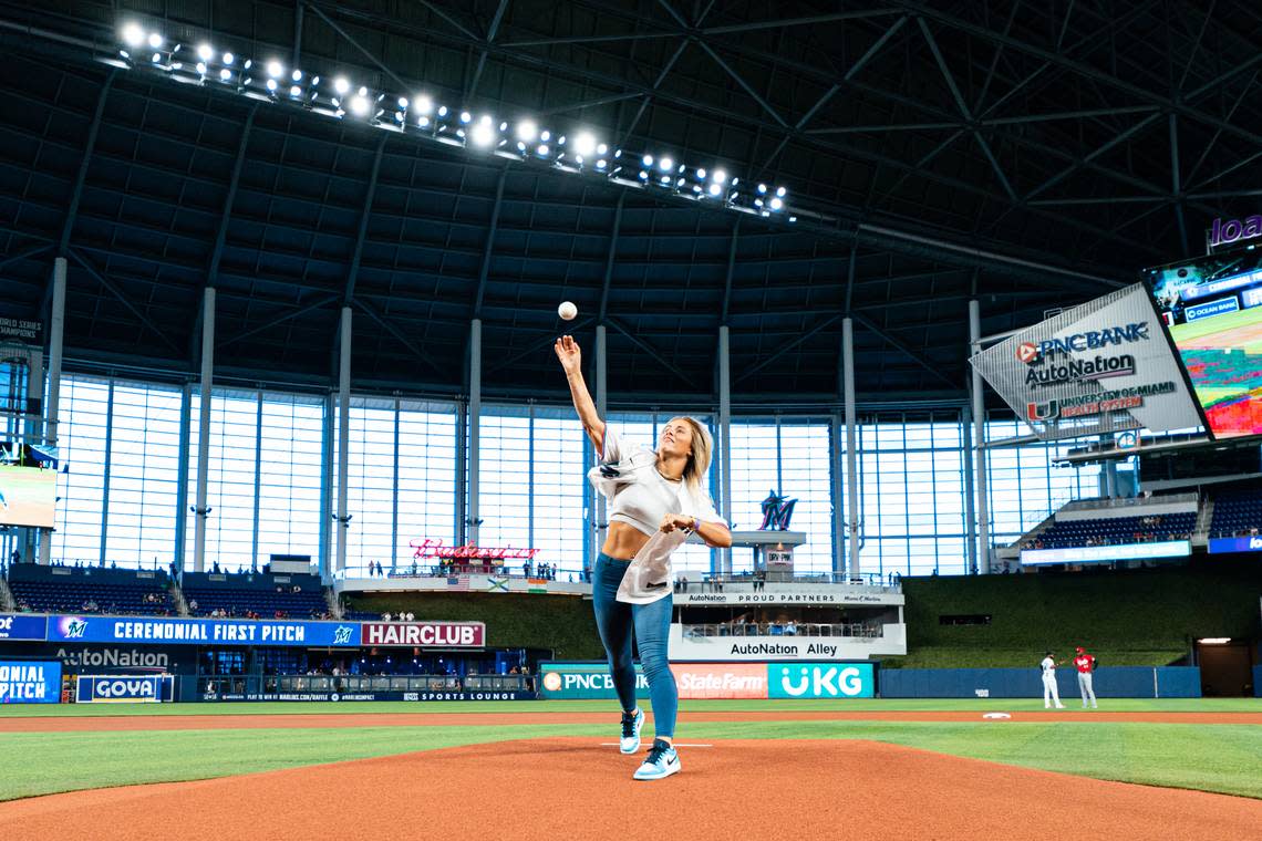 MIAMI, FLORIDA - AUGUST 3: Paige VanZant throws out the first pitch before a baseball game between the Miami Marlins and the Cincinnati Reds on August 3, 2022 at loanDepot park in Miami, Florida.