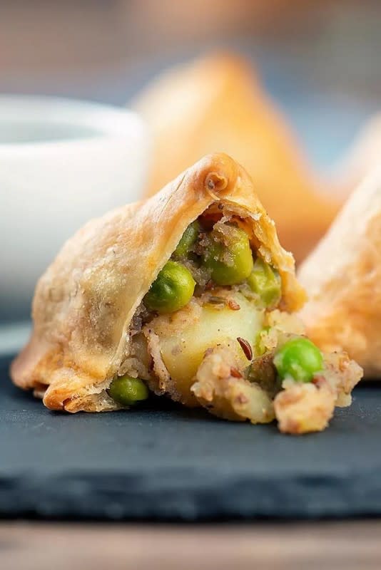 <p>The Belly Rules The Mind</p><p>The ever-so-popular samosa—minus all the fat.</p><p><strong>Get the recipe here: <a href="https://thebellyrulesthemind.net/samosa-recipe/" rel="nofollow noopener" target="_blank" data-ylk="slk:Air Fryer Punjabi Samosa;elm:context_link;itc:0;sec:content-canvas" class="link ">Air Fryer Punjabi Samosa</a></strong></p>