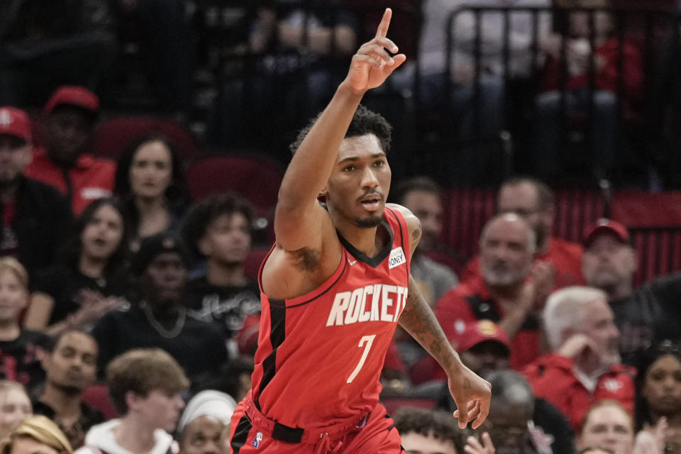 Houston Rockets guard Armoni Brooks reacts after making a basket during the first half of an NBA basketball game against the Brooklyn Nets, Wednesday, Dec. 8, 2021, in Houston. (AP Photo/Eric Christian Smith)