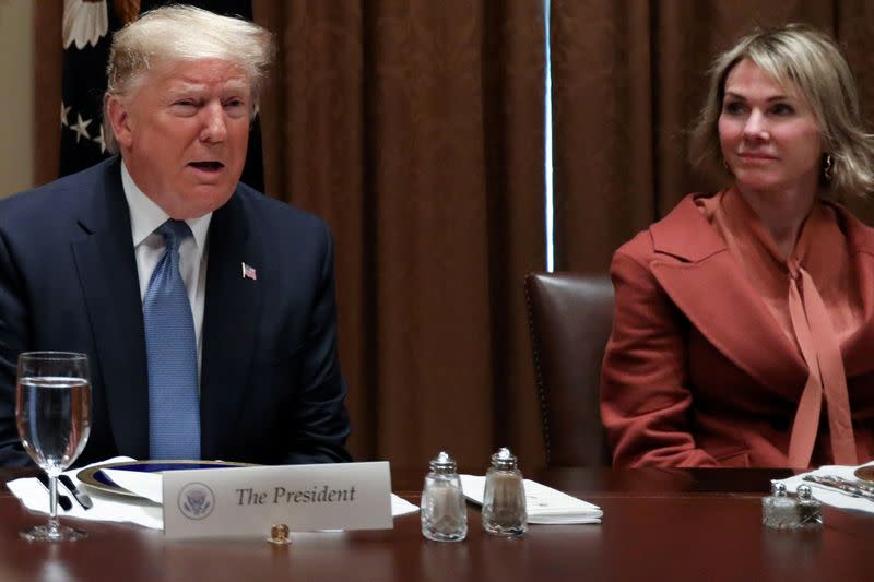 FILE PHOTO: U.S. President Donald Trump — with larger salt and pepper shakers than his guests — hosts a lunch for ambassadors to the U.N. Security Council at the White House in Washington