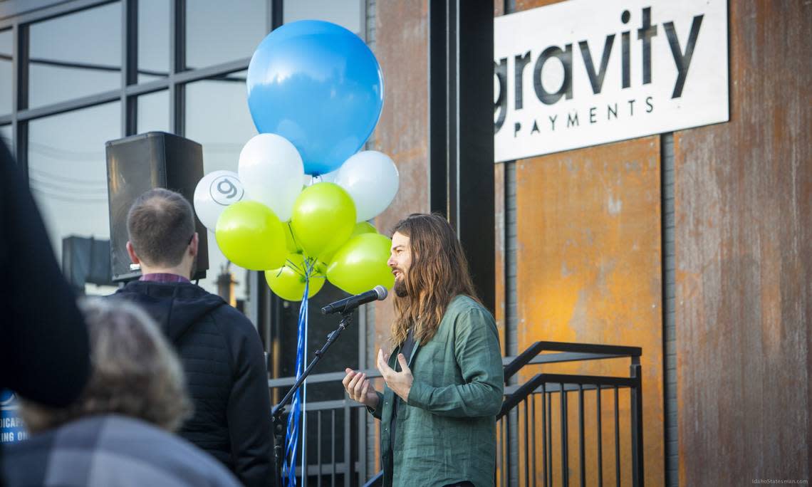 Price speaks at the 2019 opening of Gravity Payments’ Boise office west of downtown. The office was closed during the coronavirus pandemic, and many Gravity Payments jobs today are performed by remote workers.