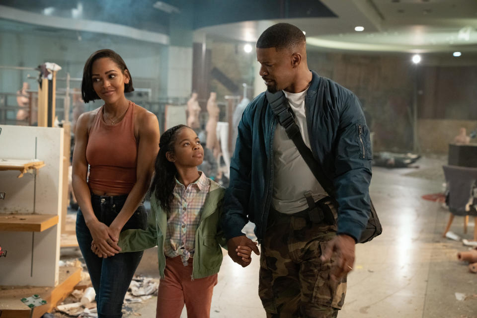 DAY SHIFT. (L to R) Meagan Good as Jocelyn, Zion Broadnax as Paige and Jamie Foxx as Bud in Day Shift. Cr. Parrish Lewis/Netflix © 2022
