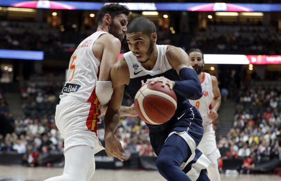 United States' Jayson Tatum, right, is defended by Spain's Rudy Fernandez during the second half of an exhibition basketball game Friday, Aug. 16, 2019, in Anaheim, Calif. (AP Photo/Marcio Jose Sanchez)