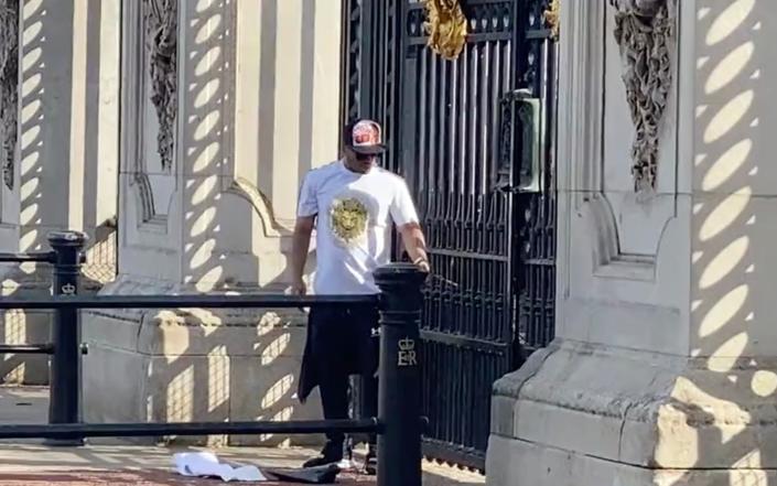 The man handcuffed to the Buckingham Palace railings
